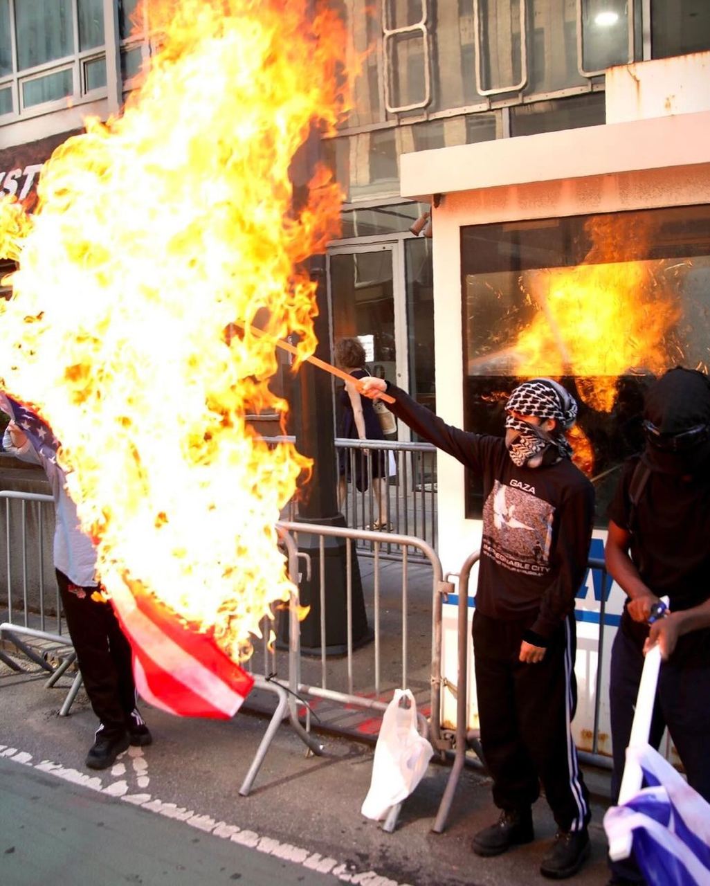 amerikan & zionist Flags Burned at Consulate General of “Israel” in NYC